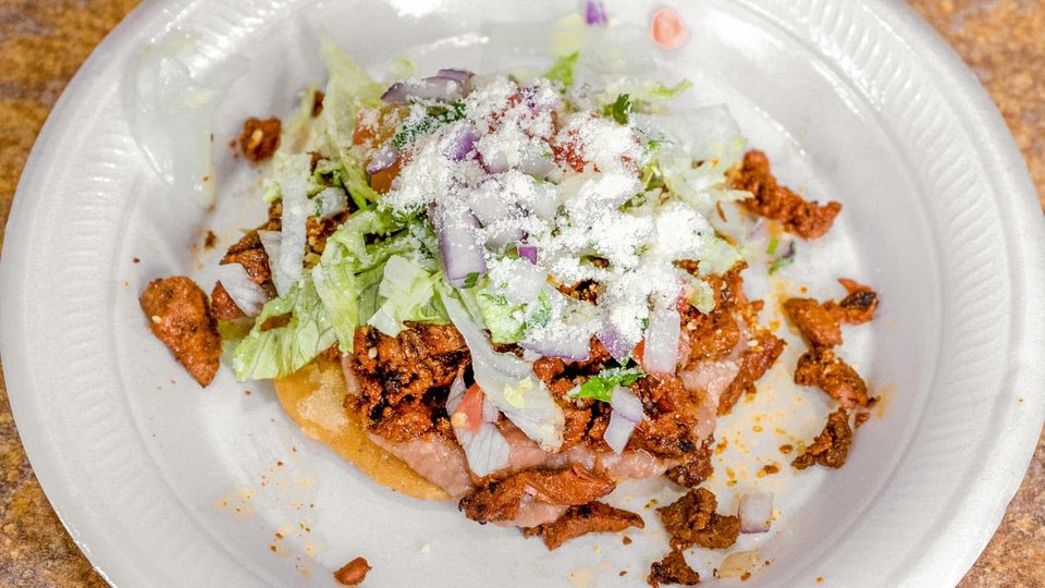 Colorful plates on a Mexican restaurant table.