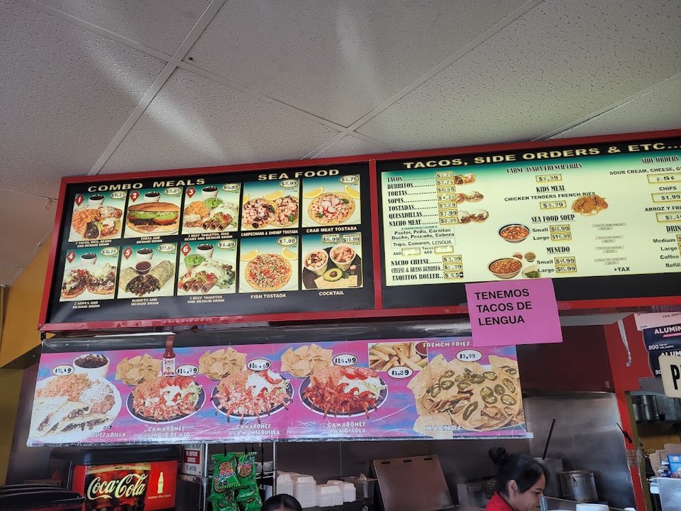 Mexican menu page with seafood dishes.